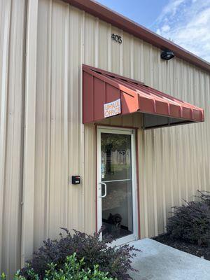 Our U-Haul office is located under the red awning where the "U-Haul" Office sign is!