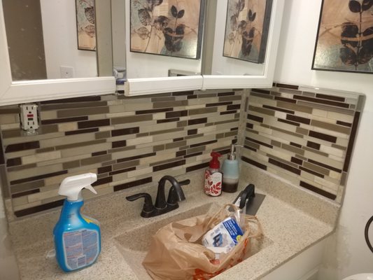 New sink top and mosaic tile backsplash