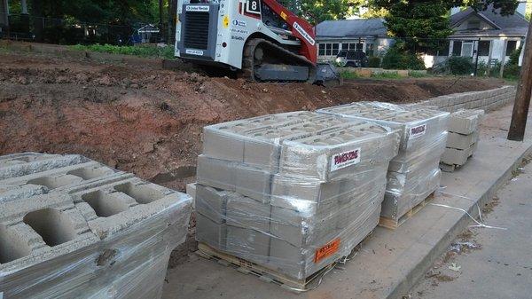 Inter-lock retaining wall installation