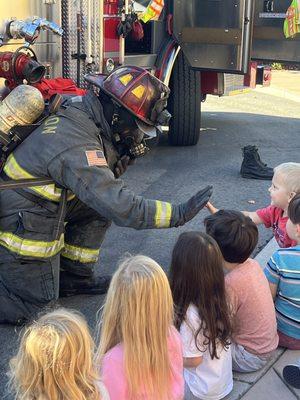 Firefighters stopped by the school to greet the students.