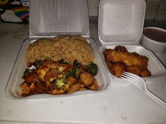 Triple delight with fried rice, sweet and sour chicken and an egg roll