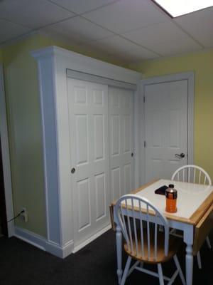 Turned a 1 door closet into a sliding 2 door laundry room w/ custom trim.