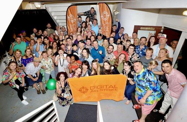 DAS employees, friends and family enjoy a fireworks boat ride for 2023 President's Club trip in Waikiki Beach, Hawaii.