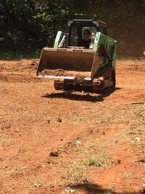 The crew riding bobcats