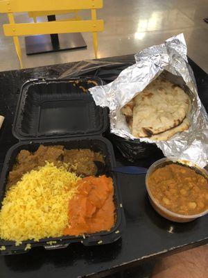 Lamb, Chicken Tikka Masala, rice large plate with a side of Chana Masala and Garlic Naan