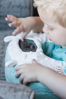 Super happy toddler learning numbers and colors with his Snuggwugg