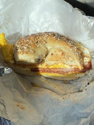 Taylor ham, egg and cheese on toasted everything bagel. Still hot after 15 min.