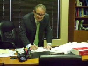 Mr. Lehrman busy working on a case at his desk