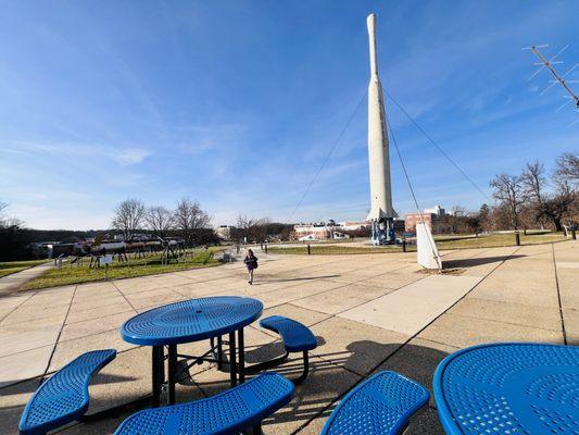 Outside space in back with more exhibits and about 15 picnic tables - wooded area.