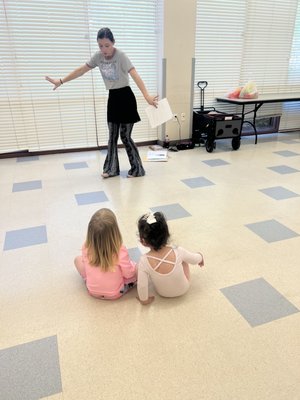 Teacher instructing the toddlers