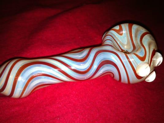 My glass pipe blown by a local artist. Part of a collection in one of the display cases.