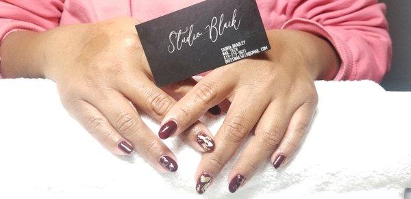 Maroonscape Gel polish with gold transfer foil.