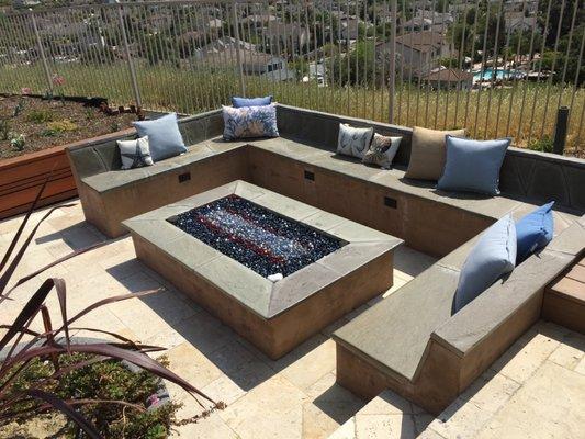 Custom Built outdoor stone seating & fire pit