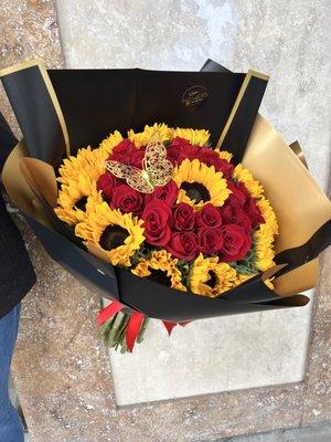 Roses & sunflowers  our most request bouquet combo .