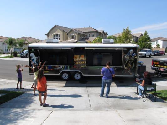 Outside screens in action. Game On Game Truck.