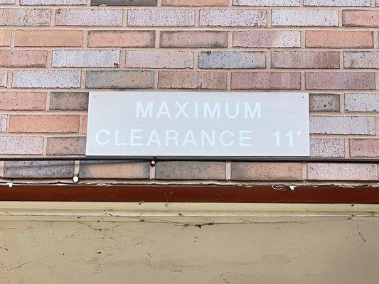 MAXIMUM                                CLEARANCE 11'                       8" x 24" sign.