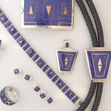 High quality Lapis inlaid in sterling silver.