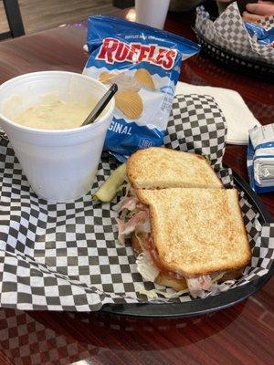 Loaded potato soup and ham sandwich.