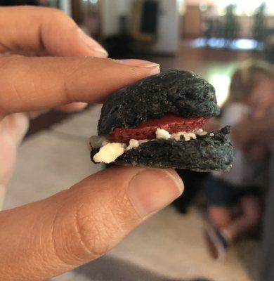 The most delicious little biscuit there ever was. With ashed goat cheese and a pickled strawberry.