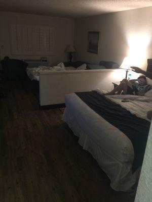 Huge bed and a loving room space or extra bed!  Check out the beautiful floor!