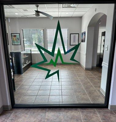 Whole Leaf glass window logo