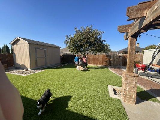 A beautiful family and a brand new turf yard!