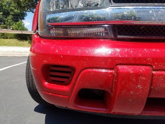 This car wash totally fails to even touch the front of a vehicle.