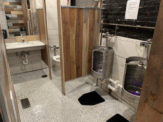 Touch-less restroom with keg pissers