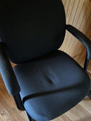 Dirty chair in guest room.