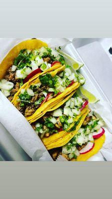 Typical street tacos are served with choice of either Al Pastor, Chicken, Steak or Veggie, topped with cilantro, onions, radish and lime.