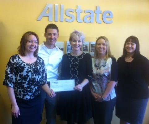 Our agency presenting WomenSafe with a grant.