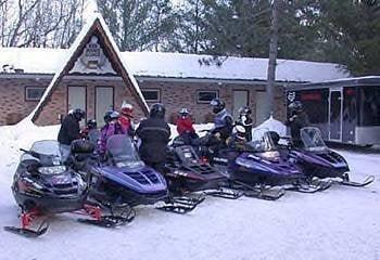 Snowmobiling from the Motel & went downhill skiing the next day