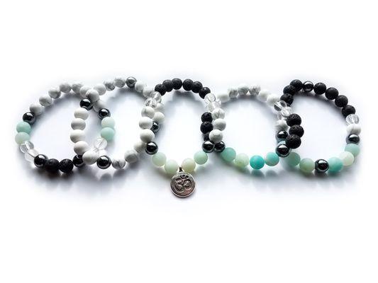 Grouping of the amazonite collection of bracelets with lava stones (can scent with essential oils), and balancing beads.