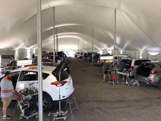 Hail Season 2018 - 30 additional technicians working in a tent at DIA