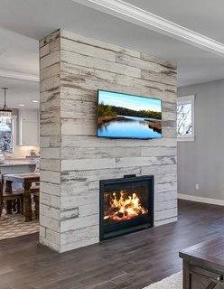 Wood plank looking fireplace we did!