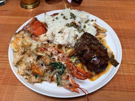 Lobster, Crab, Filet mignon, and fries. Way, way over the top.