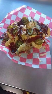 Love this specialty it BBQ Nachos with Micks own special cheese sauce unlike anything g out there! Available at special events.