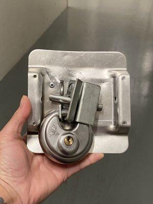 Someone cut the whole piece of the lock.