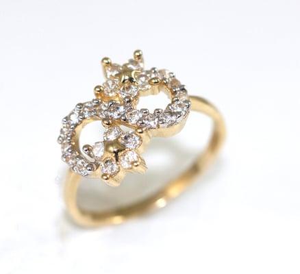 http://www.amazon.com/Yellow-Gold-flower-Ring-size/dp/B008768WIQ/ref=sr_1_77?s=jewelry&ie=UTF8&qid=1339793778&sr=1-77