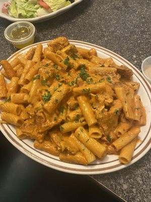 Vodka rigatoni with breaded chicken