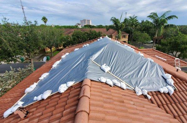 Heavy Duty 10mil tarp installation.