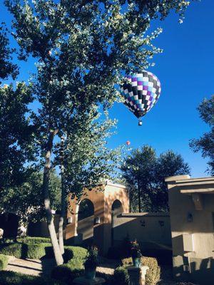 A balloon fiesta flyby right over the property