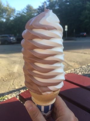 A large chocolate / vanilla soft serve swirl