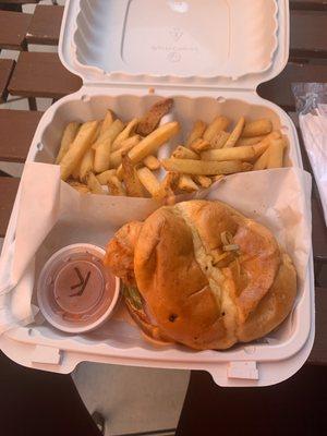 Chicken sandwich with lettuce, tomato, pickles, and special sauce with a side of fries! One of the best I've had!