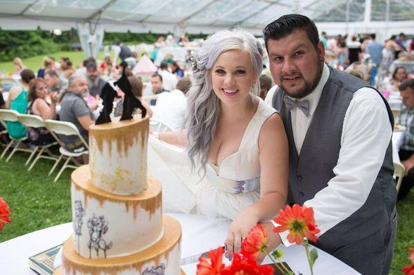 http://www.misssarascakery.com/wedding-cakes.html Hand sketched Disney Themed Wedding Cake.  Topsy Turvy with Golden Pixie Dust. Edible cake