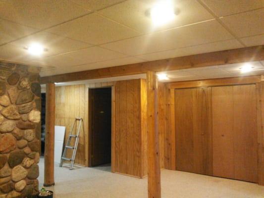 Drop ceiling in log cabin that I did.  Really brightened up the basement