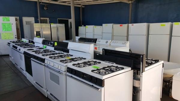 A selection of dryers, refrigerators, stoves, washers, and toilets.