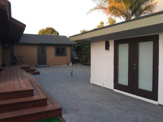 Courtyard patio w/ modern pavers - another view. All drainage, gutter drains, hose bibs, gas & electrical lines, Ethernet, etc. installed.