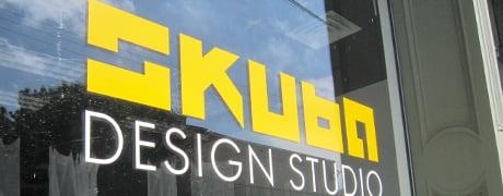 Outside the office of Skuba Design Studio at the corner of Magazine and Jackson. Stop in to meet our talented creative team.