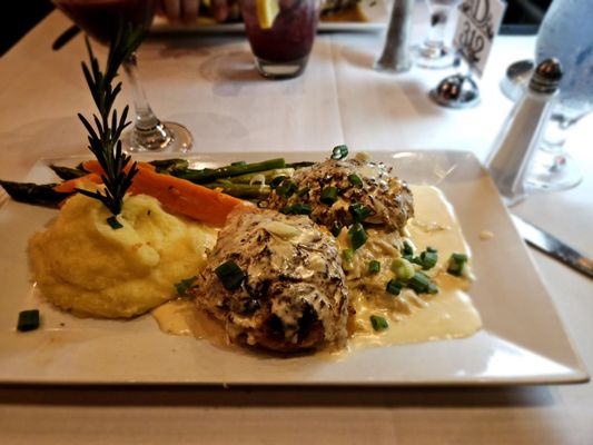 Orange sized Crab Cakes with buttery mashed potatoes yum!